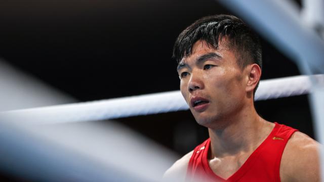 欧冠-视网膜两次脱落 胡建关靠毅力站在东奥拳击赛场